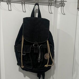 2003 Vintage Kipling Small Black Backpack with Tan Drawstrings